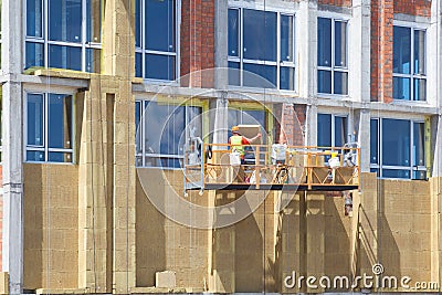 Exterior house wall heat insulation with mineral wool, building under construction Editorial Stock Photo