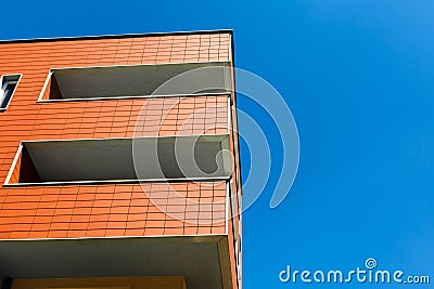 Exterior of a modern apartment buildings on blue sky backgrou Stock Photo