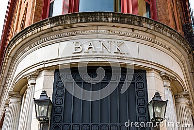 Old Bank Building Exterior with Bank Sign Stock Photo
