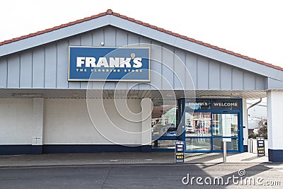 Exterior outside shot of Franks Carpter Flooring Store showing company sign and entrance Editorial Stock Photo