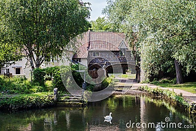 Exterior Of Pulls Ferry On River Wensum In Norwich Norfolk UK Stock Photo