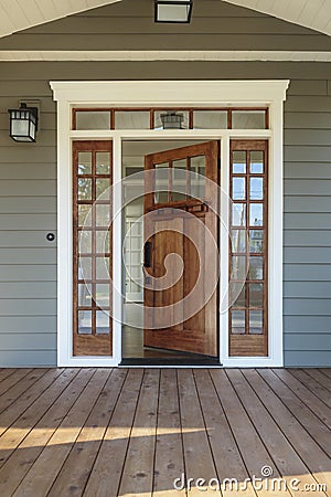 Exterior shot of an open Wooden Front Door Stock Photo