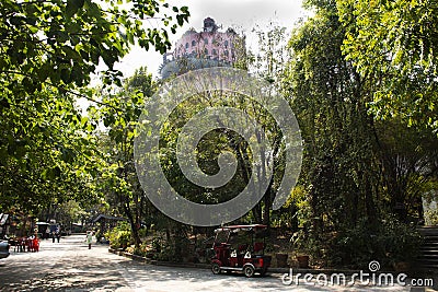 Exterior tower building with king of serpent naga and chinese dragon for thai people travel visit respect praying of Wat Samphran Editorial Stock Photo