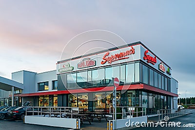 Exterior view of a building of three fast food restaurant Editorial Stock Photo