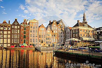 Exterior view of buildings at Damrak street in the old town part Editorial Stock Photo