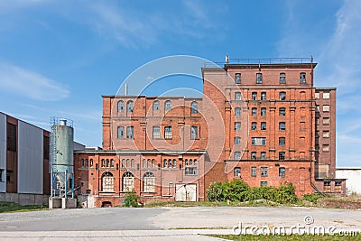 Exterior view of a decayed factory building made of brick Stock Photo