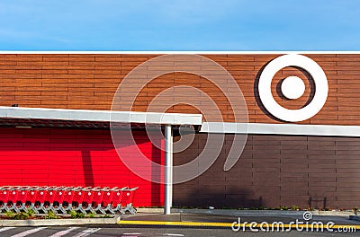 Exterior view of a newly remodeled Target store, with white bullseye logo, red and brown colors and shopping carts Editorial Stock Photo