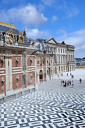 Ornate statuary and courtyard of the royal palace at Versailles Editorial Stock Photo