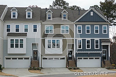 A row of four-story townhouses. Stock Photo