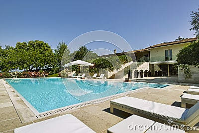 Exteriors shots of a modern swimming ppol Stock Photo