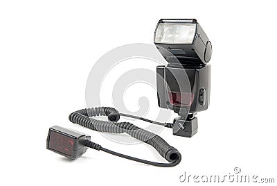 External flash connected to off-camera shoe cord Stock Photo