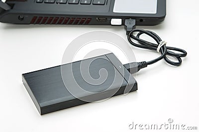 External hard disk connect to computer notebook Stock Photo