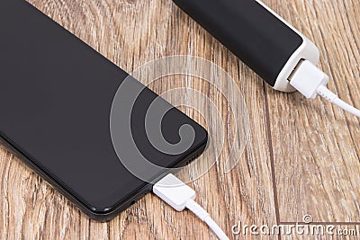 External powerbank charging battery of smartphone or mobile phone Stock Photo