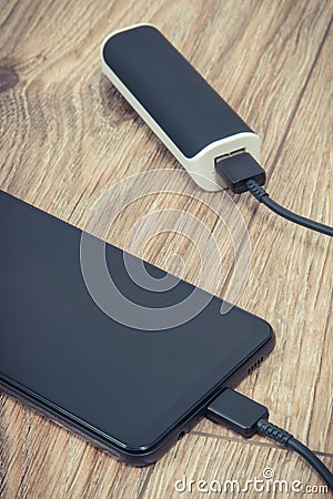 External powerbank charging battery of smartphone or mobile phone Stock Photo