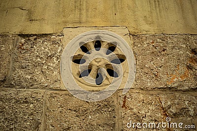 External rose-window on residential building Stock Photo