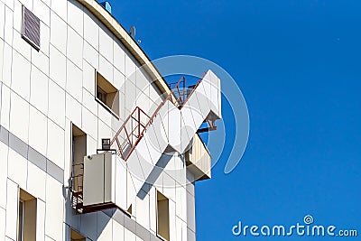 External staircase from the top floor of the building to the roof. Stock Photo