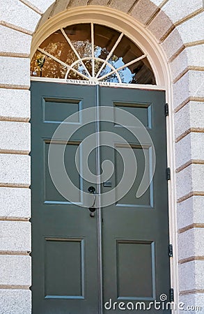 External view of a locked entrance to one of the campus Library`s at Harvard University. Editorial Stock Photo