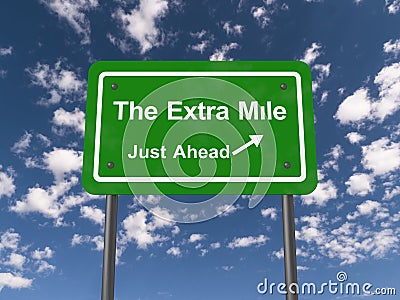 The extra mile just ahead road sign Stock Photo