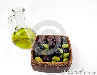 Extra virgin olive oil with fresh olives. Stock Photo
