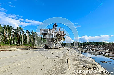 Extraction of quartz sand walking excavators. Stock Photo