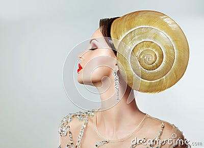 Extravagancy. Outlandish Extreme Hairstyle. Peculiar Woman with Snail as Headwear Stock Photo