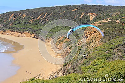 Parashoot flying along the coast Stock Photo