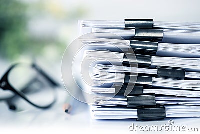 extreamly close up the stacking of office working document with Stock Photo
