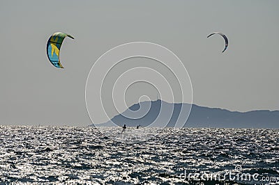 Hyeres, Almanarre beach, France, July 10, 2021. Extreem water sport - wing foil, kite surfing, wind surfindg, windy day on Stock Photo