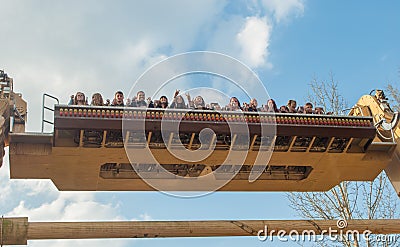 Extreme attraction and people on it in an amusement park Editorial Stock Photo