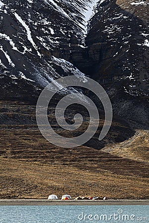 Extreme camping in Svalbard Stock Photo