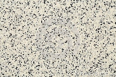 Extreme close up of decorative quartz sand epoxy floor or wall coating with different shades of grey, white and black coloured Stock Photo