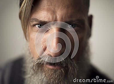 Extreme close up portrait of an attractive bearded man Stock Photo