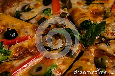 Extreme close up shot of yummy Picante pizza loaded with vagetables Stock Photo