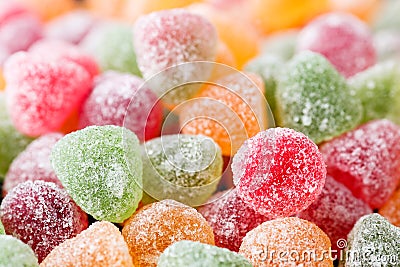 Close up of a variety of mint jelly bonbons with sugar crystals icing in different flavors and colors. Macro food background textu Stock Photo