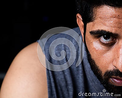 Closeup of Beard man cleaning sweat with towel after workout Stock Photo