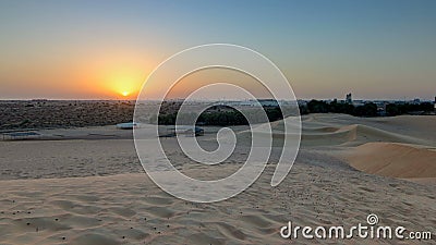 Extreme desert landscape timelapse with orange sunset, beautiful sandy background with hot sunlight, United Arab Stock Photo