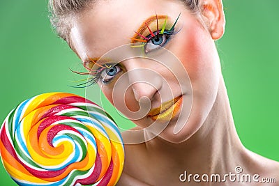 Extremely beauty colorful lollipop, comes with matching makeup Stock Photo