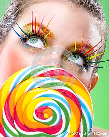 Extremely beauty colorful lollipop, comes with matching makeup Stock Photo