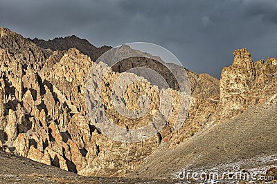 Extremely old volcanic rocks in the Stok Kangri area Stock Photo