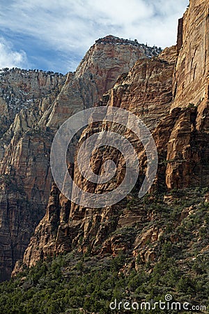 Red stone cliffs in the mountains of Zion national park with a wide-angle perspective Stock Photo
