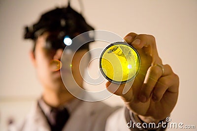 Eye Doctor examing your eyes Stock Photo