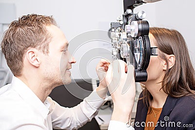 Eye exam at optician Stock Photo