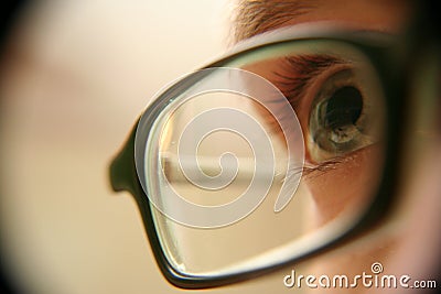 Eye with glasses closeup Stock Photo