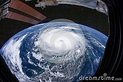 Eye of the hurricane. Typhoon over the planet Earth, view through the porthole of the space station. A category 5 super Typhoon Stock Photo