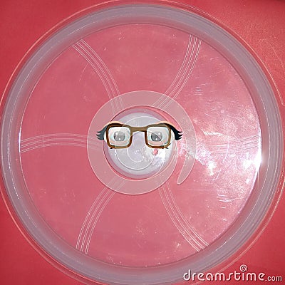 It is eye sight eye testing equipment human eye pink colour background close up highly science and technology Stock Photo