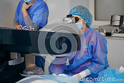 Eye surgeons perform surgery on the patient. surgeons at work. medical conceptions Stock Photo