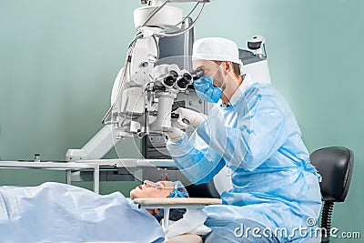 Eye surgery at the operating room Stock Photo