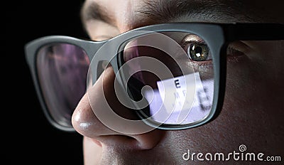 Eye test and exam concept. Close up of man with glasses. Stock Photo