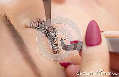 Eyelash removal procedure close up. Stock Photo