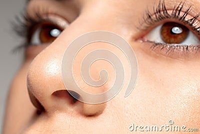 Close up portrait of beautiful jewish woman isolated on studio background. Beauty, fashion, skincare, cosmetics concept Stock Photo